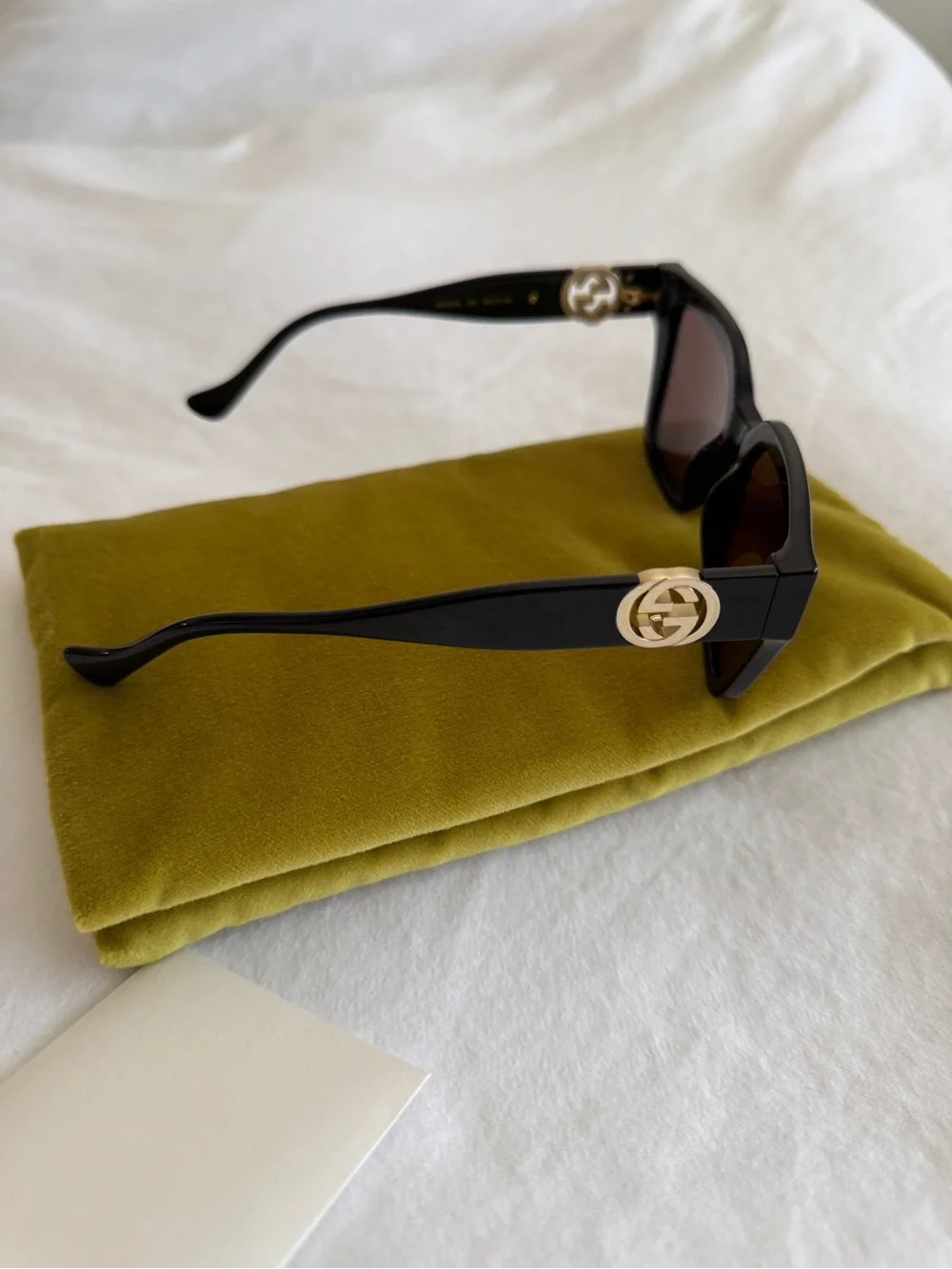 Gucci gold chain sunglasses with brown lenses